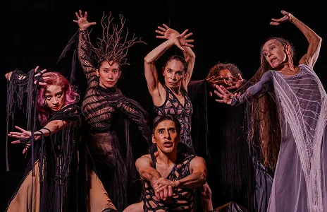 Personas en un teatro